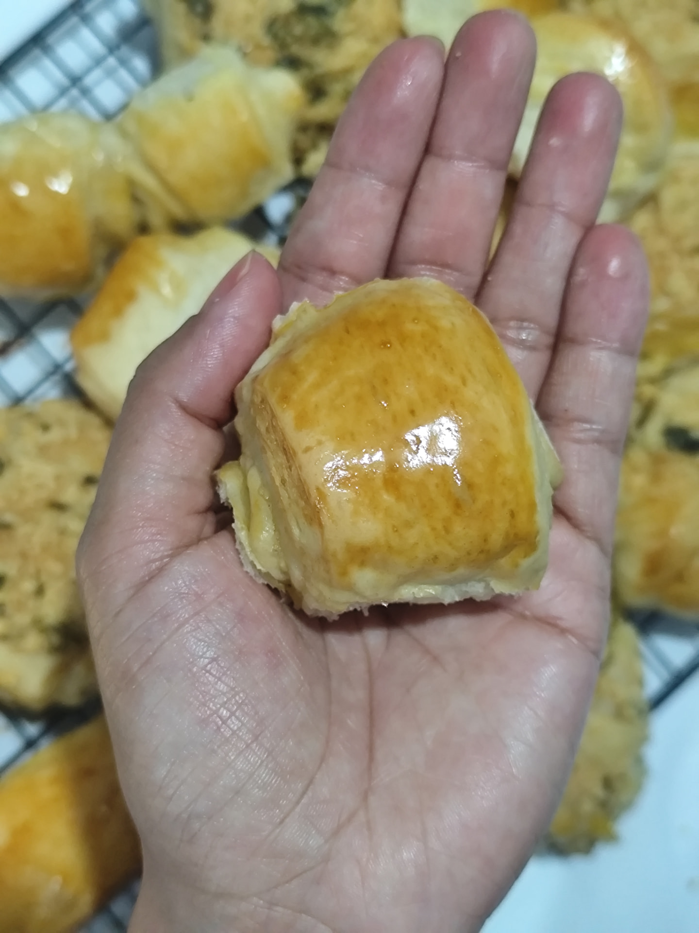 Bisnaguinha do Miolo de Leite na palma da mão